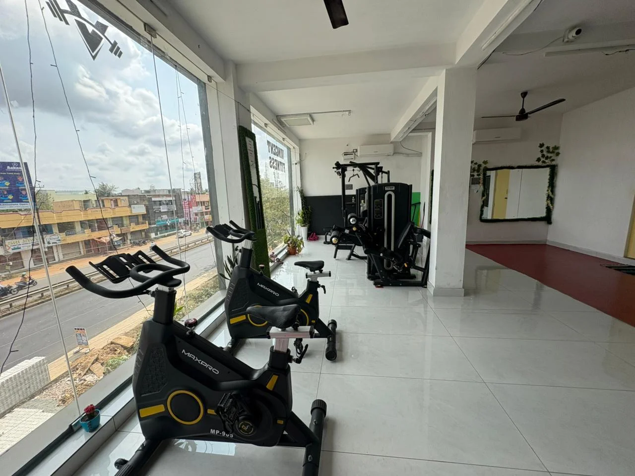 Modern cardio machines at Vincent Fitness Gym Trichy